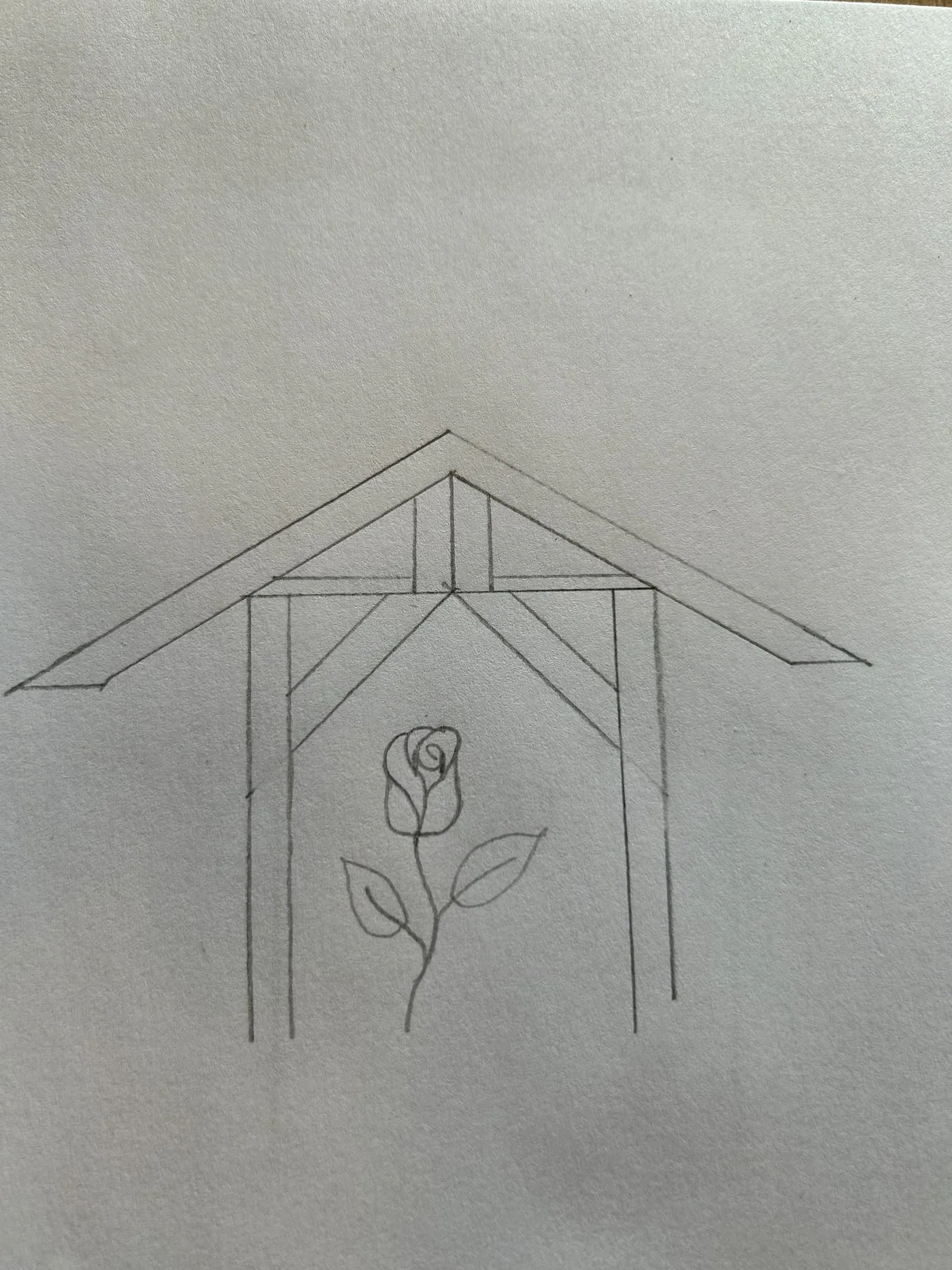 Der Entwurf ist fertig. Dachbalken, Rose und Blätter im Detail.